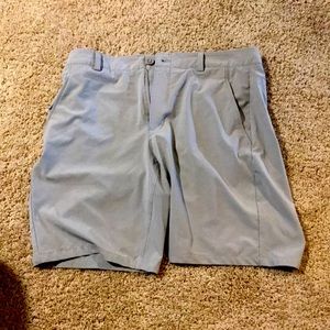 Under Armour golf shorts.